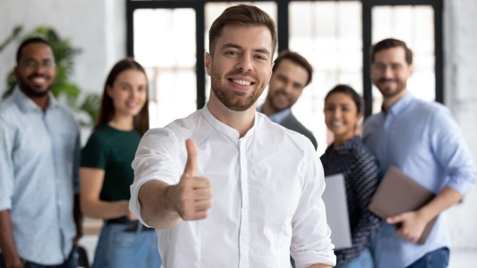 Confident Professional Giving Thumbs Up